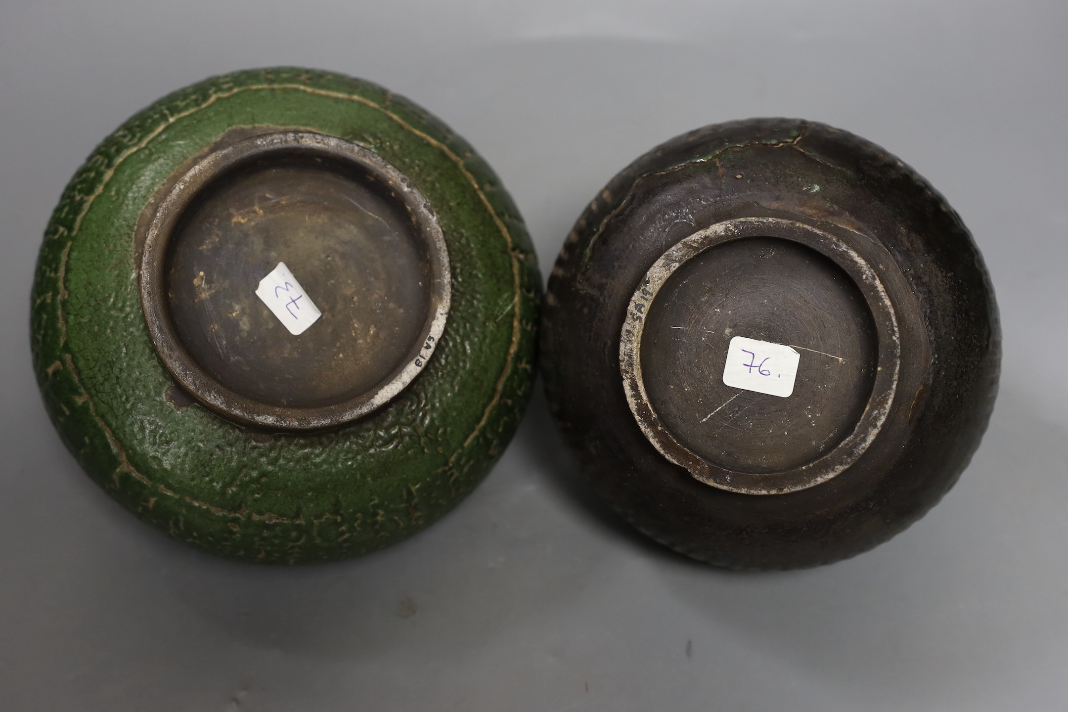 Two Thai Sawankhalok green-glazed ring handled jars, 15th-16th century, tallest 15.5cm